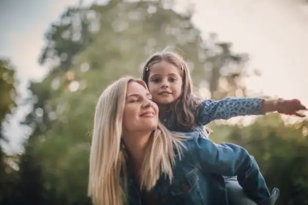 happy mum and daughter following mediation to resolve parental alienation Newport